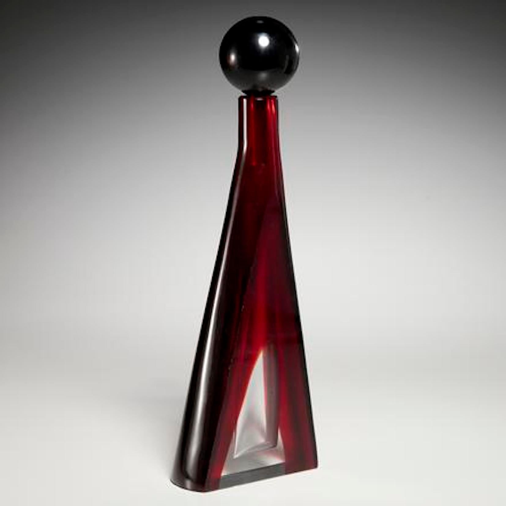 Salviati, ruby red sommerso bottle with stopper 
 dark red and clear glass, acrylic label to base
