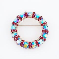 Ruby Red & Blue Aurora Borealis Crystal Wreath Brooch By Warner, 1960s