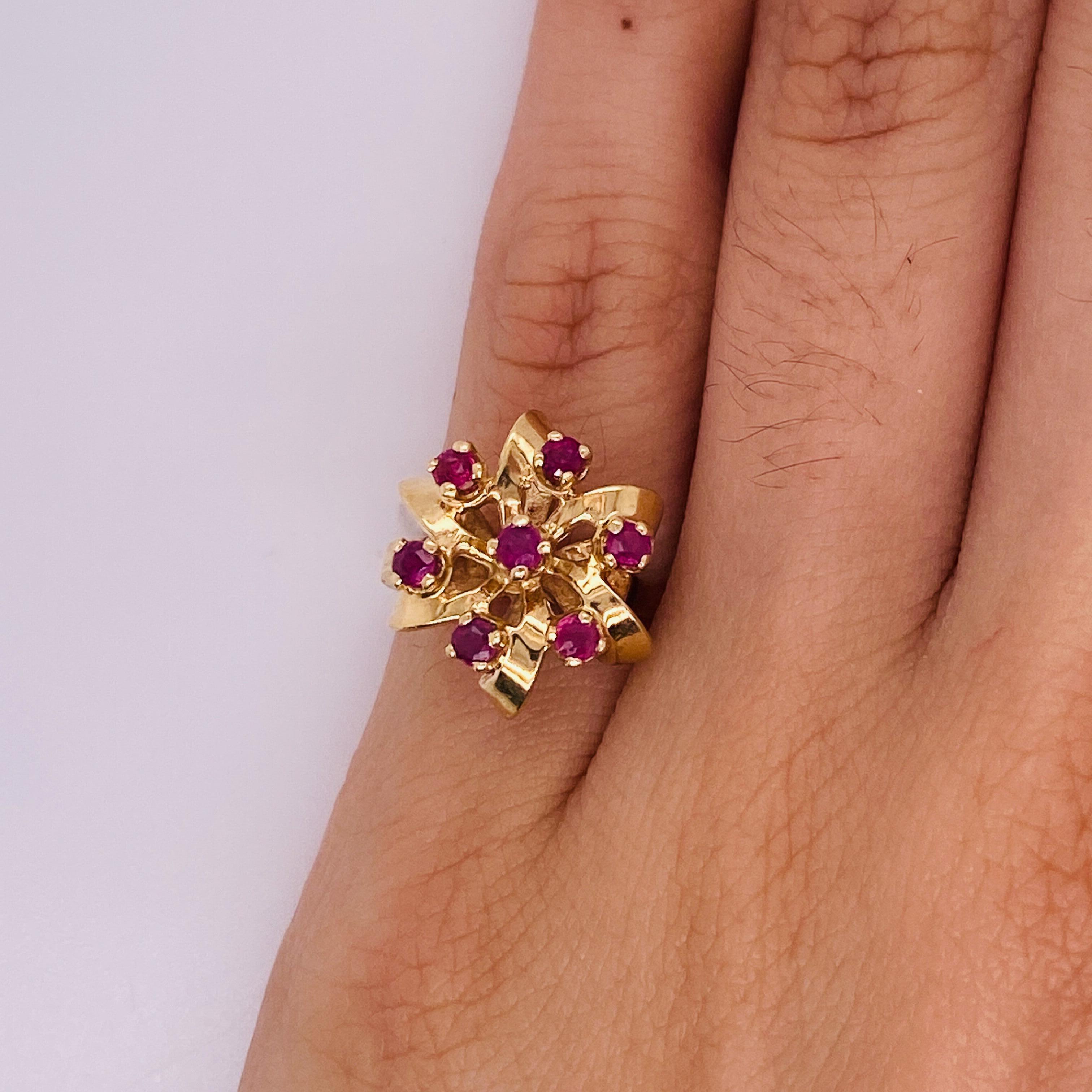 This ring is perfect to crown the hand of someone that you always consider a gift. The domed ribbon ring top wraps a bow around any day or any outfit. The rubies add their richness to the design and make a perfect splash of color to compliment the
