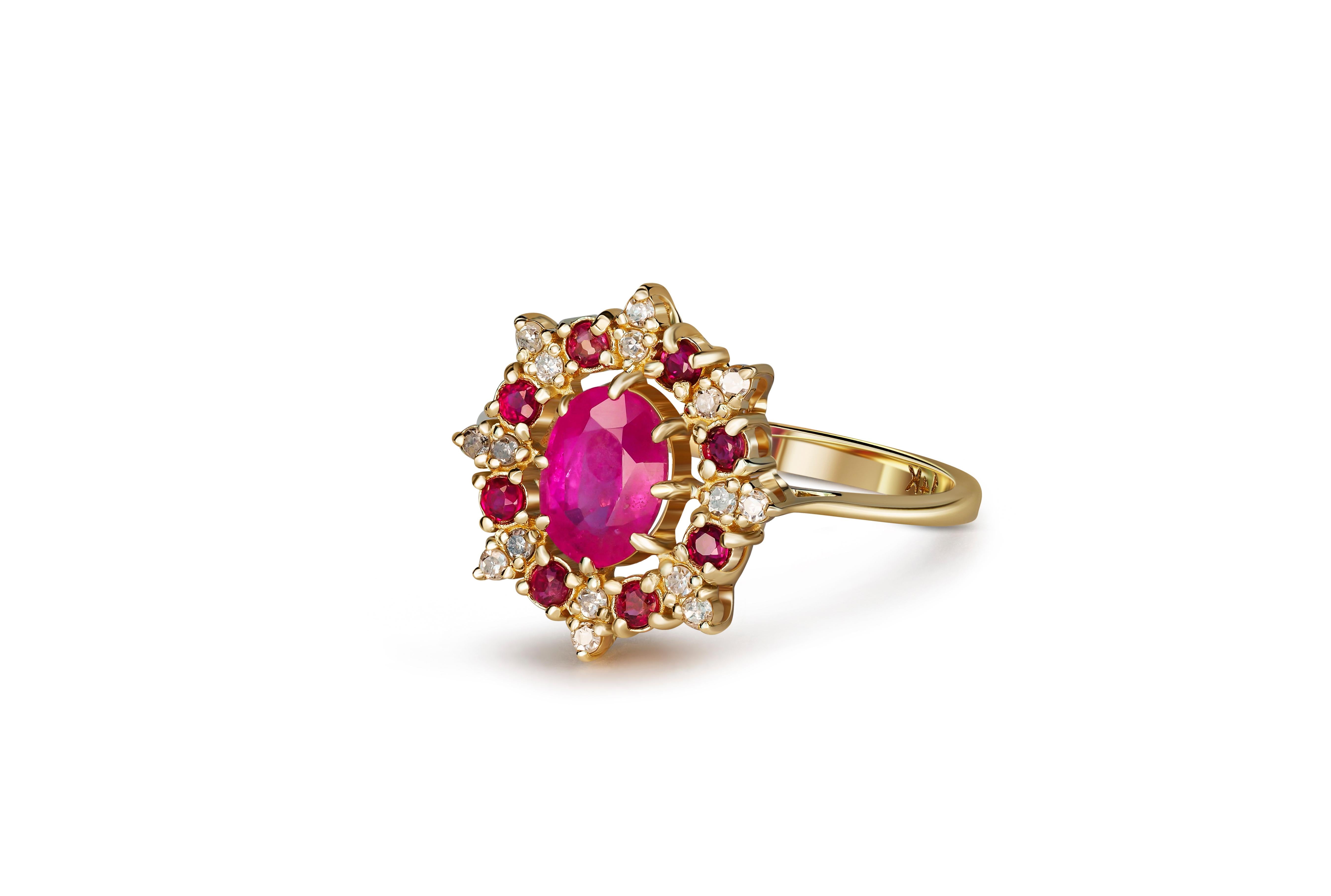 Ruby ring in 14 karat yellow gold. Ruby engagement ring in 14 k gold. 
 
14k yellow gold ring with rubies and diamonds.
Weight: 2.80 g.
Size: 17.5 mm. (US - 7.25, UK - O 1/2, FR - 55)
Central stone: Ruby
Weight: 1.35 ct.
Color: Pink
Clarity: