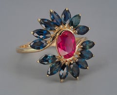 Ruby, sapphire ring in 14k gold.