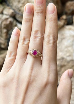 Ruby Ring set in 14K Gold Settings