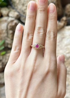 Ruby Ring set in 14K Gold Settings