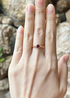 Ruby Ring set in 18K Gold Settings