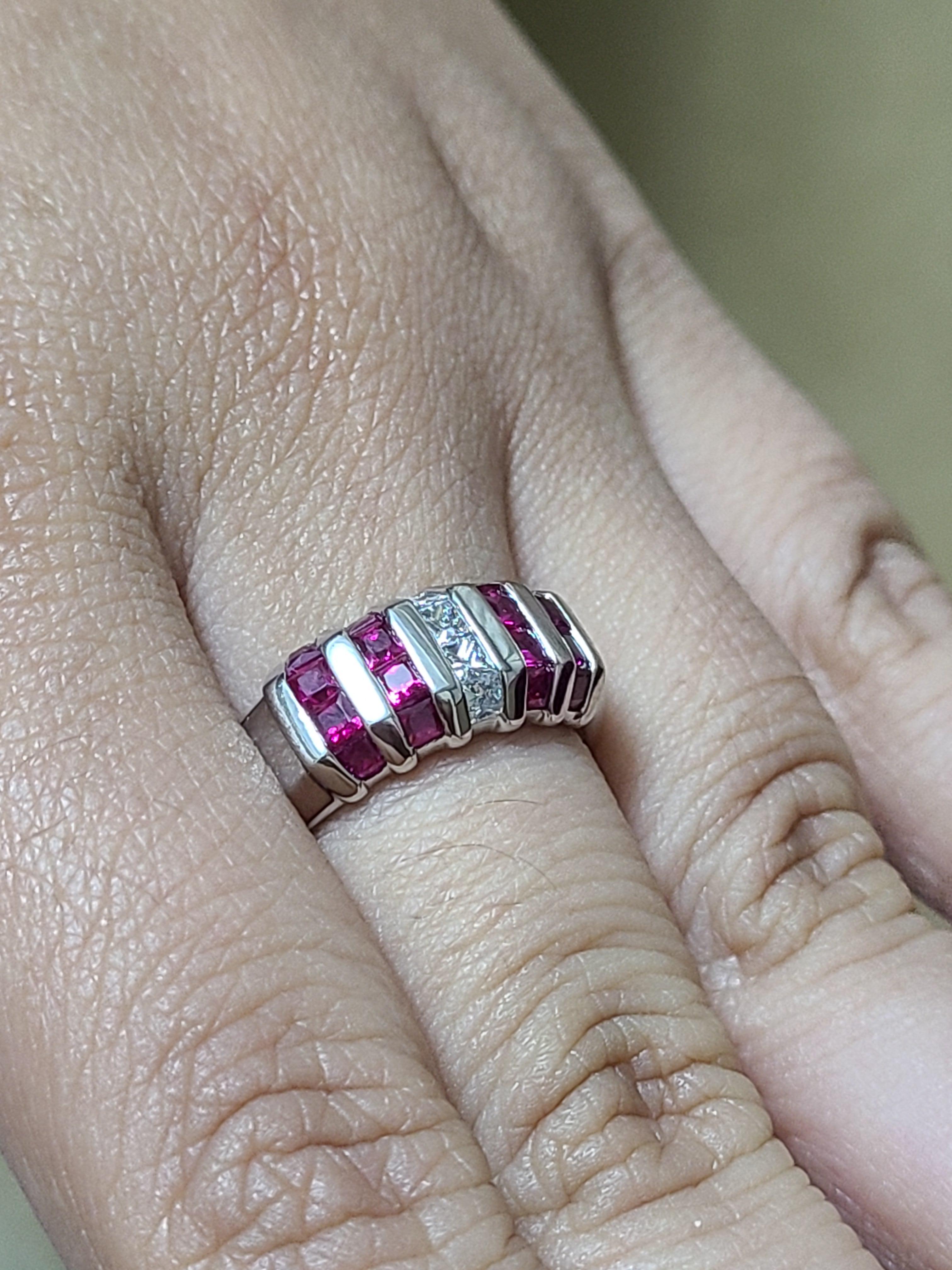 A gorgeous and Chic ruby band ring set in Platinum PT900 with diamonds . The ruby weight is 1.11 carats and diamond weight is .24 carats. The ring dimension in cm .7 x 1.8 x 2 (LXWXH). US size 6 1/2.