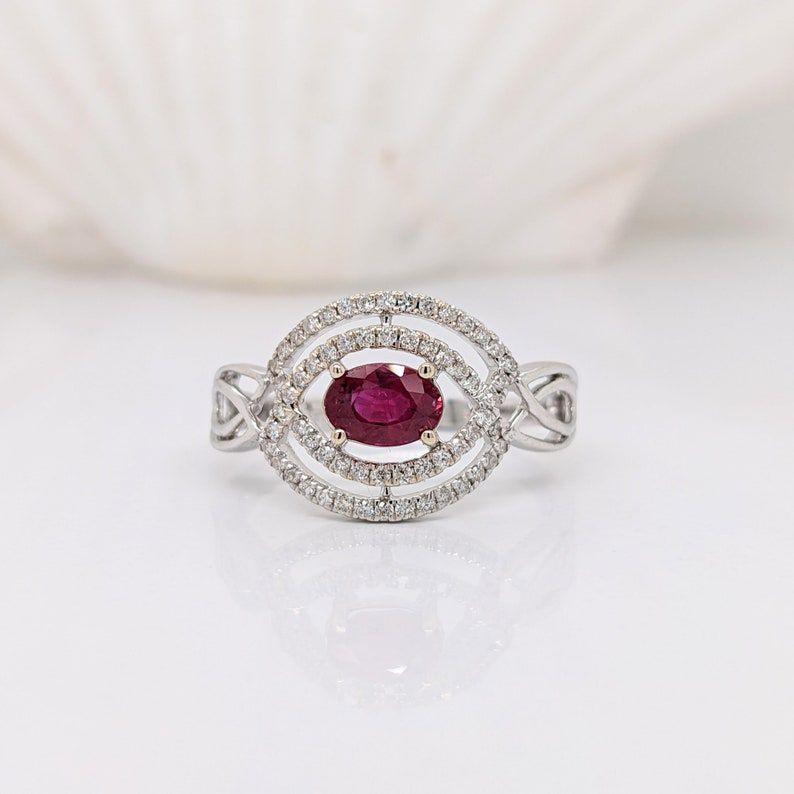 Specifications

Item Type: Ring
Stone: Ruby
Origin: Mozambique
Hardness: 9
Treatment: Heated
Cut: Faceted
Clarity: Eye-clean
Shape: Oval
Stone size: 6x4mm
Stone weight: 0.54cts
Metal: 14k Solid/2.36g
Diamonds S/I GH: 60/0.21cts
SKU: