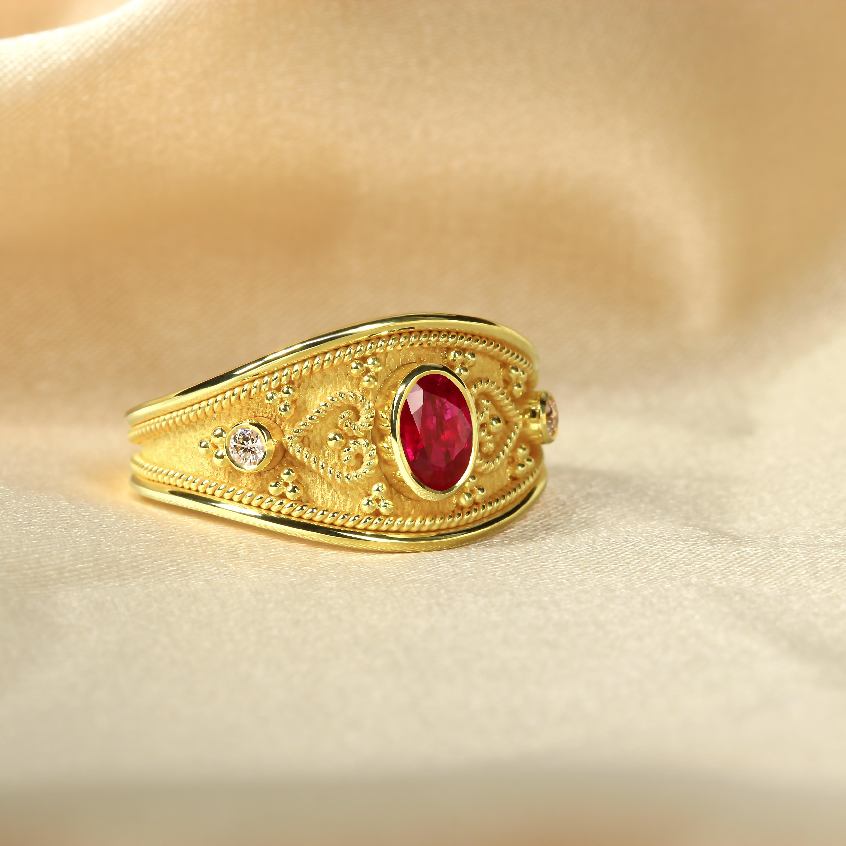 Embrace the passion and elegance of our exquisite gold ring, featuring a captivating oval deep ruby embraced by shimmering brilliance on either side. Adorned with delicate heart-shaped details, this ring exudes romance and sophistication, capturing