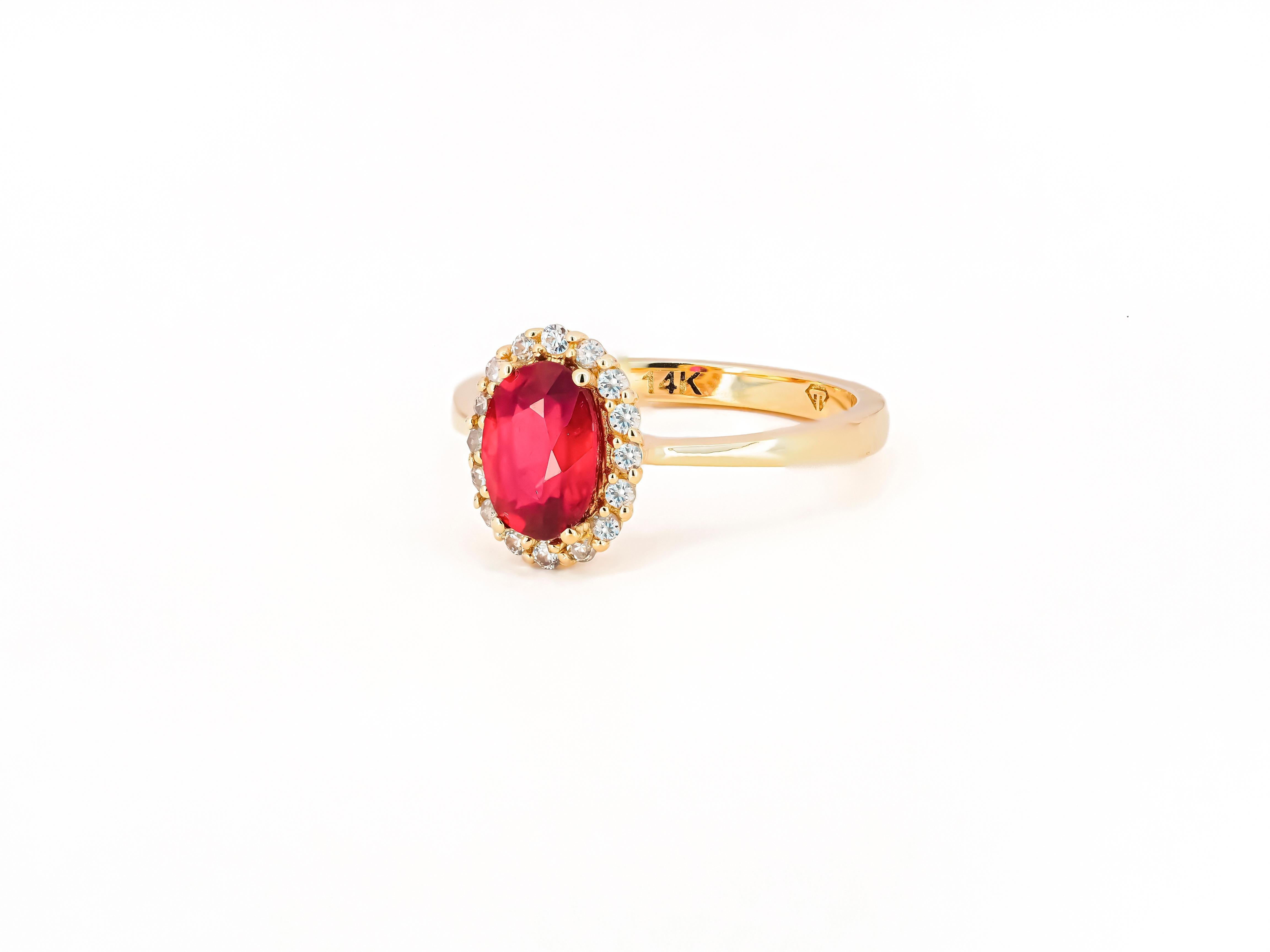 Oval Cut Ruby ring with diamond halo.  For Sale