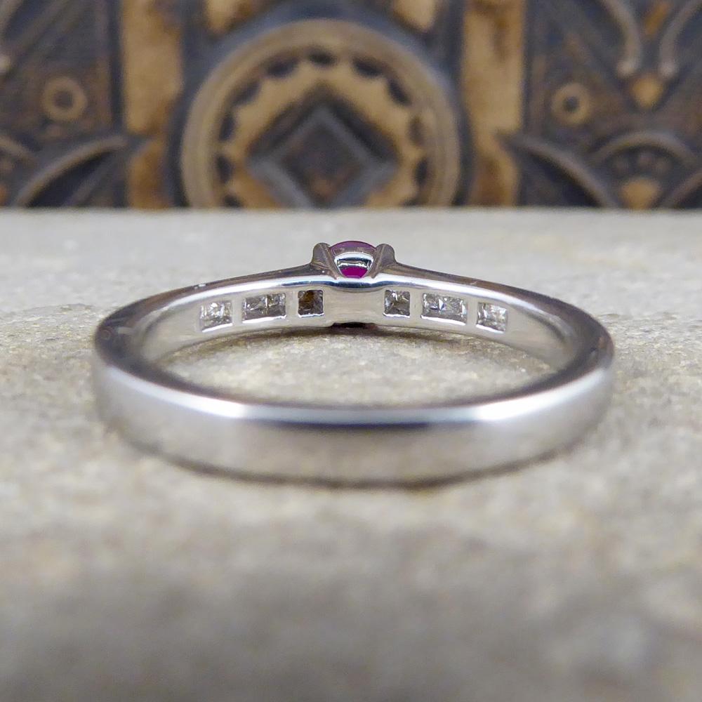 Princess Cut Ruby Ring with Diamond Set Shoulders in 18 Carat White Gold