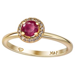 Ruby ring with diamonds halo. 