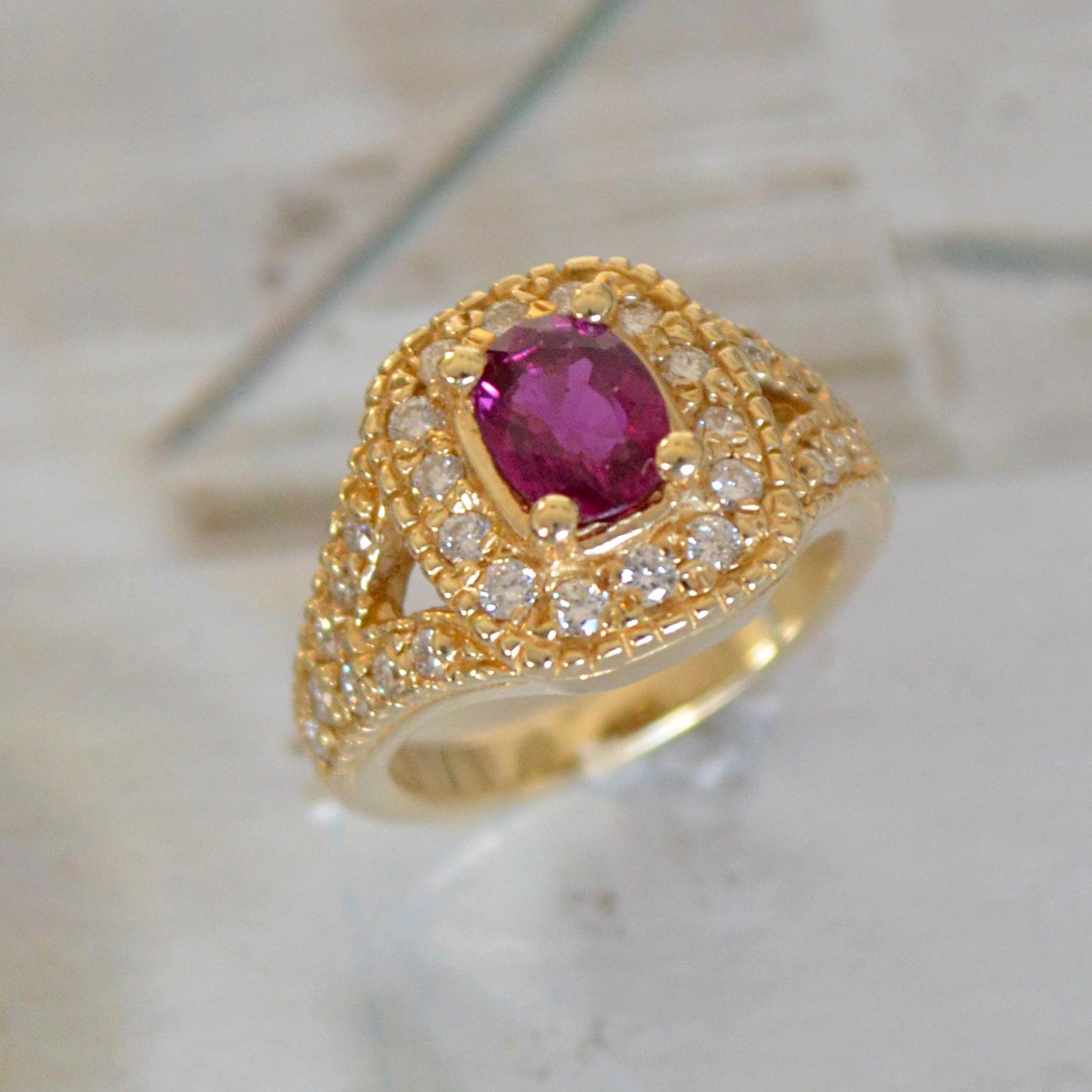Ruby Ring With Diamonds Set In Yellow Gold

Carat Weight: Apprx 1.00
Measurements: 6.8MM X 5.2MM
Color : Pinkish Red

Ring Details:
Metal: 14k Yellow
Size: 4.5 
Number of Diamonds: 30
