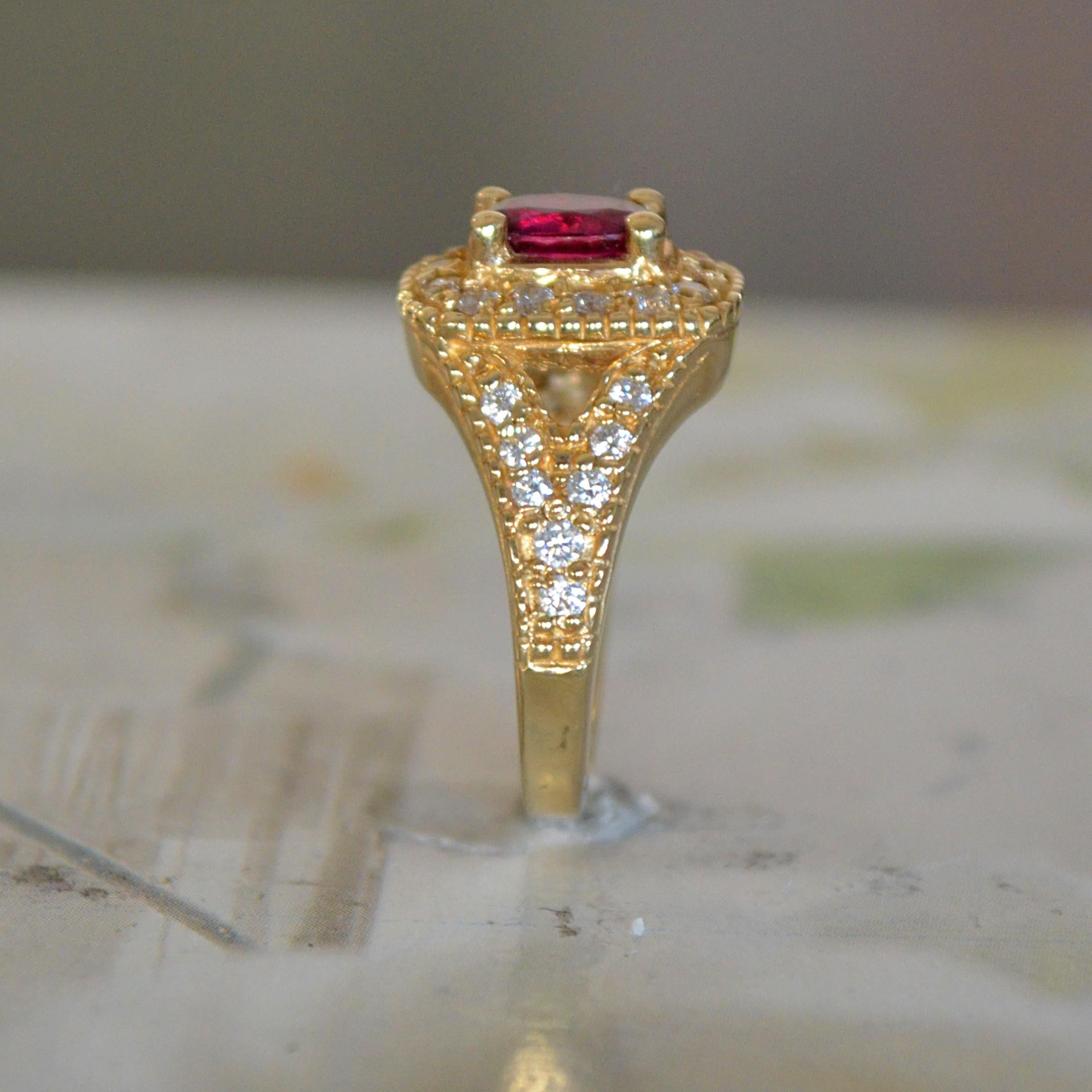 Oval Cut Ruby Ring with Diamonds Set in Yellow Gold For Sale