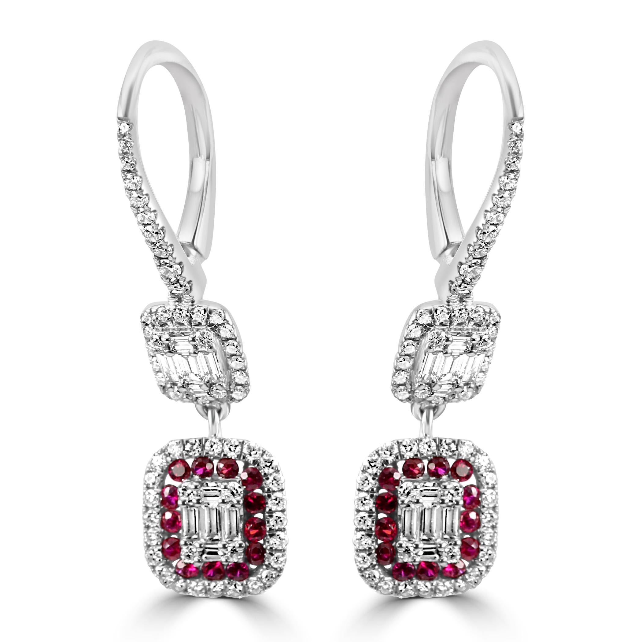 The center of each earring features 0.060 carats of baguette diamonds, carefully set by our master artisans by hand to create a sleek and modern aesthetic. The clean lines and geometric precision of the baguette cut diamonds add a beautiful flair,