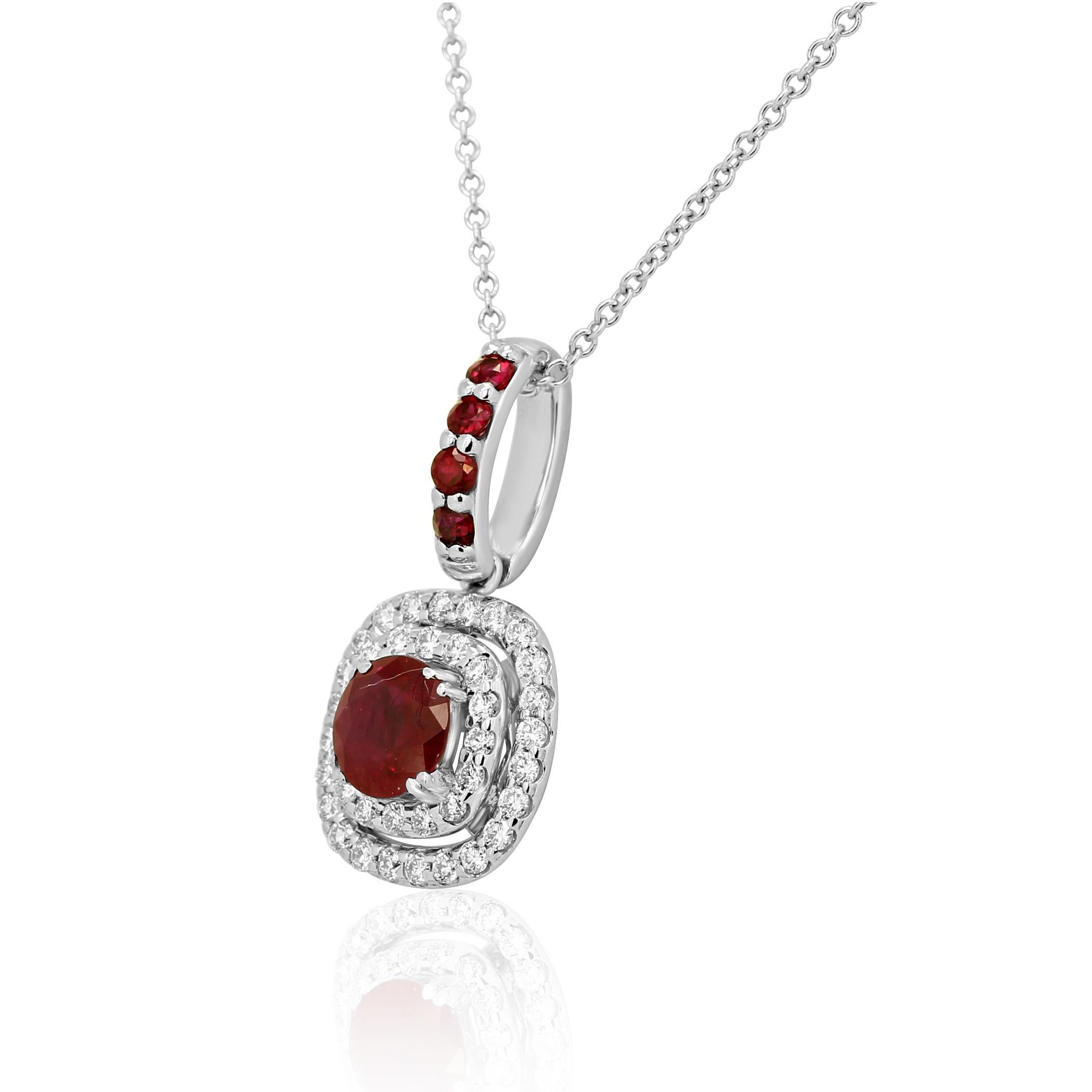Ruby Round 0.66 Carat Encircled in Double Halo White Colorless Round Brilliant VS-SI Clarity Diamonds 0.30 Carat set with  4 Ruby Rounds 0.15 Carat on the bell of 14K White Gold Pendant drop Chain Necklace.

Style available in different price