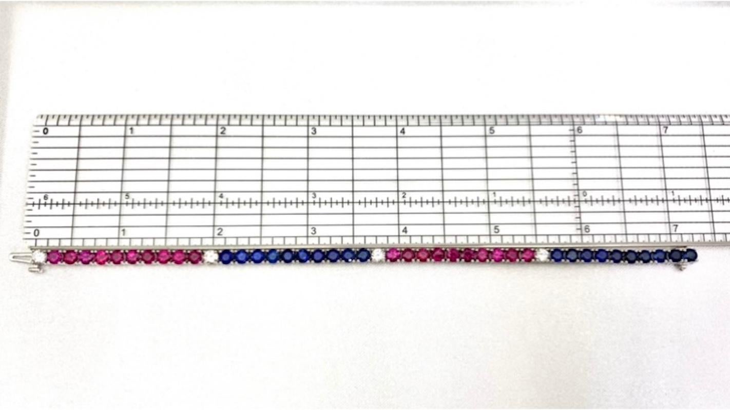 Bracciale tennis in platino con rubini, zaffiri e diamanti 