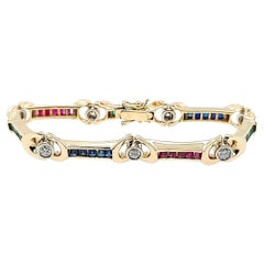 Ruby, Sapphire, and Emerald Bracelet in Yellow Gold