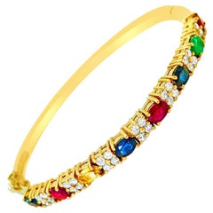 Ruby Sapphire Emerald and Diamond Bracelet in 18 Karat Yellow Gold