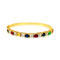 Ruby Sapphire Emerald and Diamond Bracelet in 18 Karat Yellow Gold