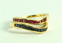 Eternity-Ring mit Rubin und Saphir aus 18 Karat