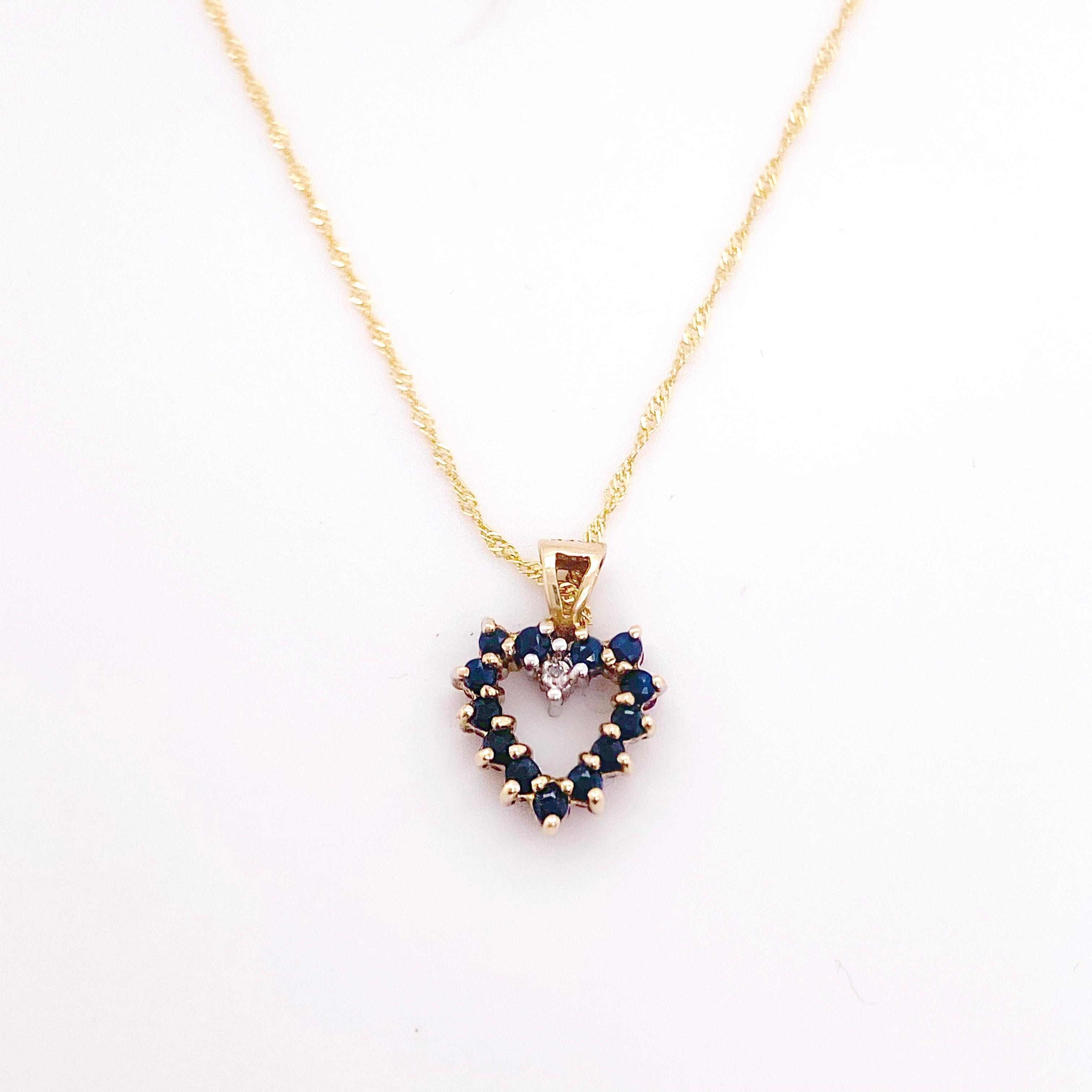 The details for this beautiful necklace are listed below:
Metal Quality: 14k Yellow Gold
Pendant Style: Open Heart
Diamond Number: 2
Diamond Diameter: .90 millimeters
Diamond Clarity: VS2 (Excellent, Eye Clean)
Diamond Color: G (Excellent, Near