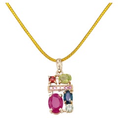 Ruby, sapphire, peridot, tourmaline, garnet and side pink sapphires pendant