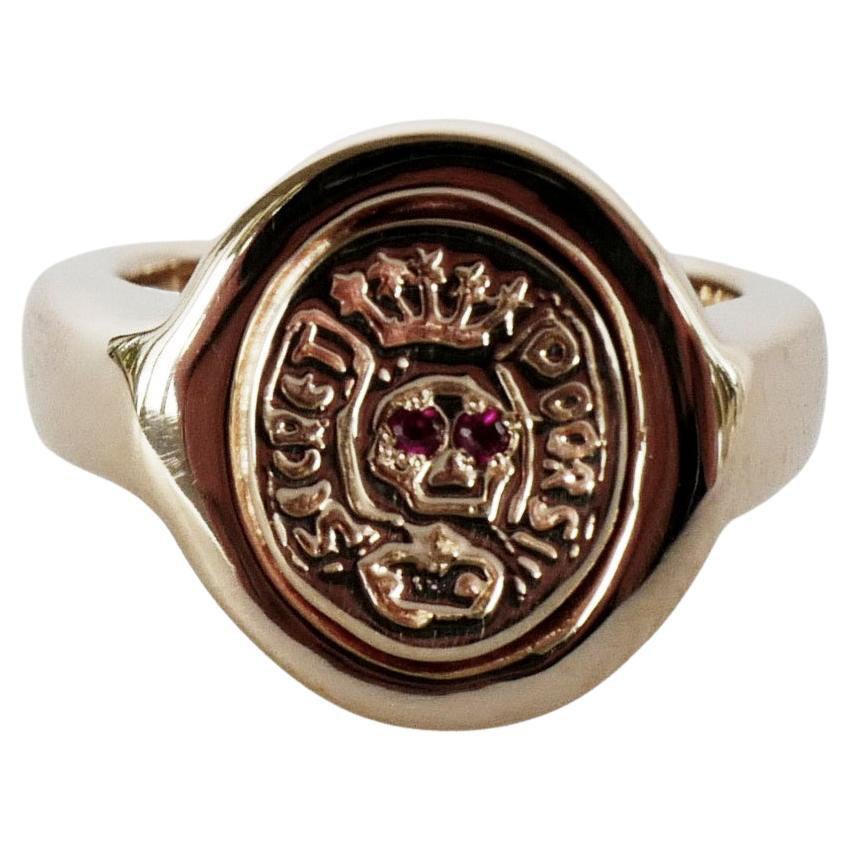 Anillo con calavera, anillo con escudo, anillo de sello, anillo de cóctel de oro con rubí en venta