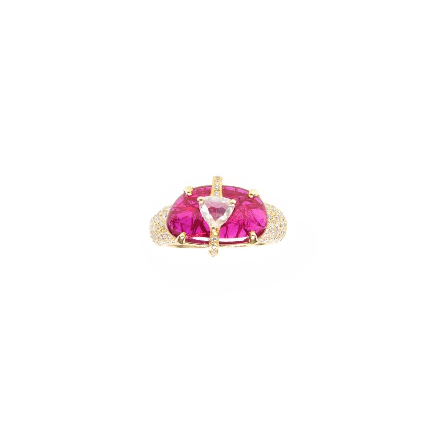 Make a stunning statement with Ri Noor's Ruby Slice Diamond Ring. Featuring an intricate arrangement of stones, the striking ring consists of a substantial unenhanced ruby topped with a trillion cut diamond all set in 18k yellow gold with a band