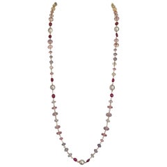 Ruby, South Sea Pearls, Pink and Blue Topaz Pink Amethyst Beads in 18 Karat Gold