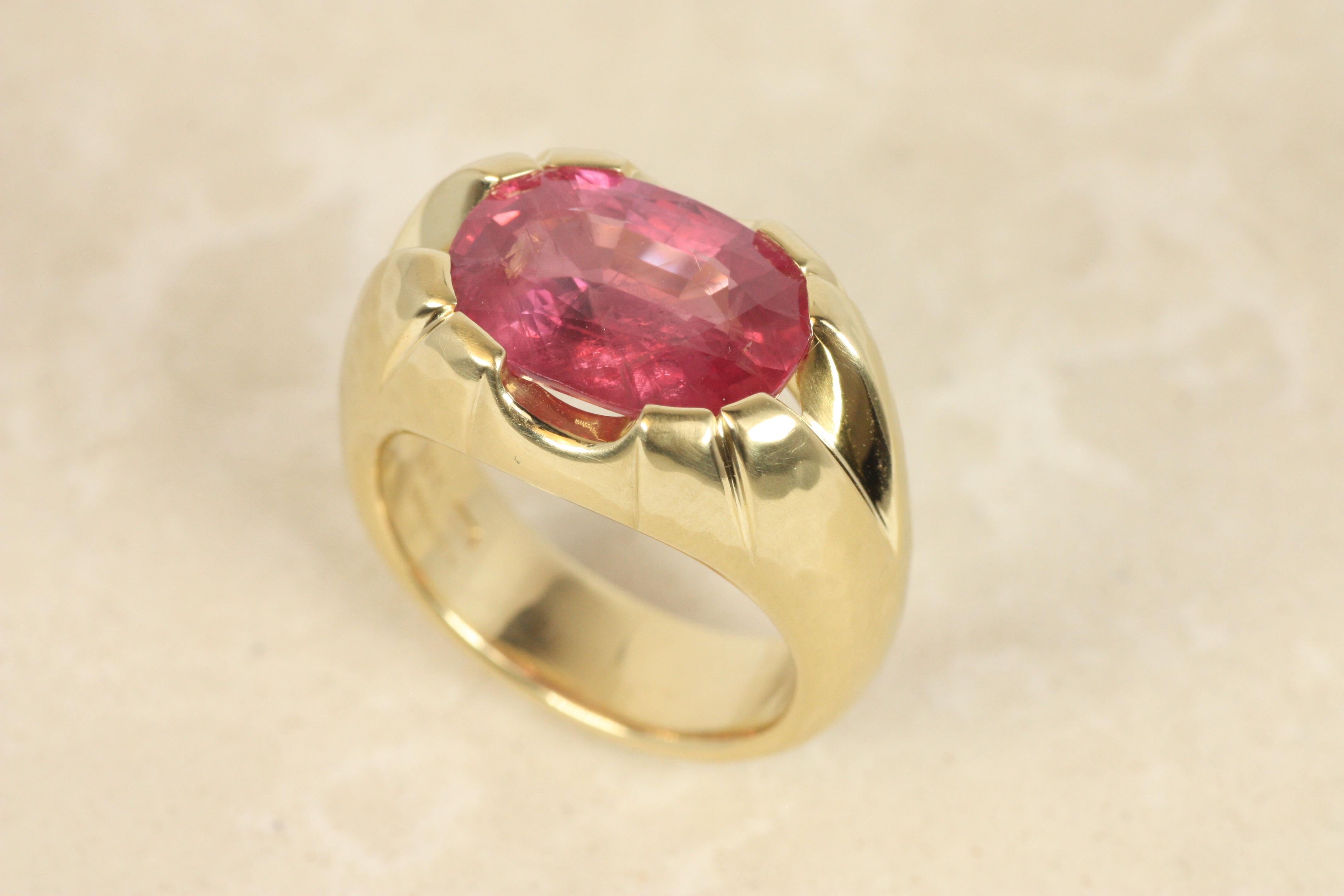 A bold and timeless statement, this one-of-a-kind ruby ring features a striking 6.66ct faceted oval ruby, glowing with deep red fire. Set in 18K yellow gold, the split shank design creates a unique openness that really accentuates the rare stone.