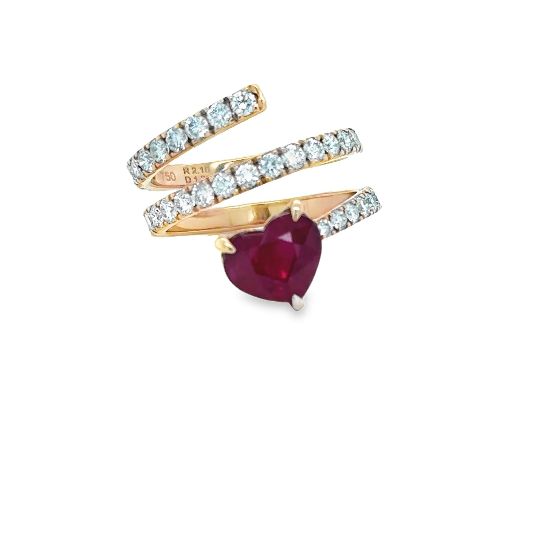 Love, in its purest essence, finds expression in this ring. 
This Beautiful 18K Rose Gold Ring is set with one Heart mixed cut Natural Ruby & Thirty Five Round Brilliant cut Natural Diamonds. 
In a world where true elegance lies in the details, this