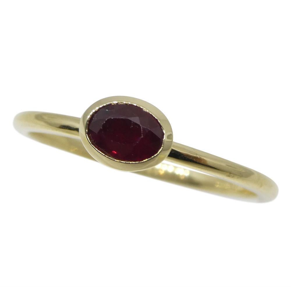 Oval Cut Ruby Stacker Ring set in 10kt Yellow Gold For Sale