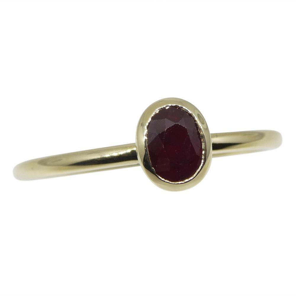 Oval Cut Ruby Stacker Ring set in 10kt Yellow Gold For Sale