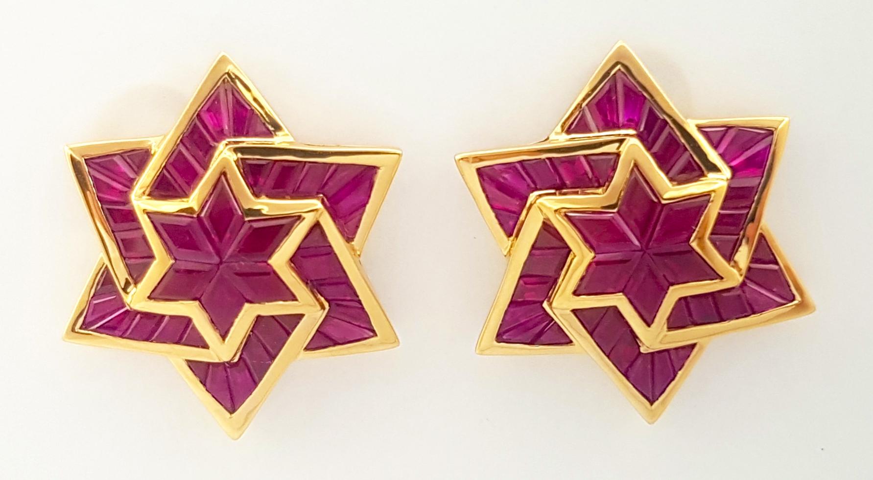 Contemporary Ruby Star Earrings set in 18K Gold Settings For Sale