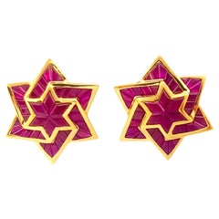 Ruby Star Earrings set in 18K Gold Settings