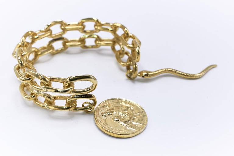 Ruby Statement Arm Cuff Chain Bracelet Virgin Mary Medal Snake J Dauphin at 1stDibs snake medal
