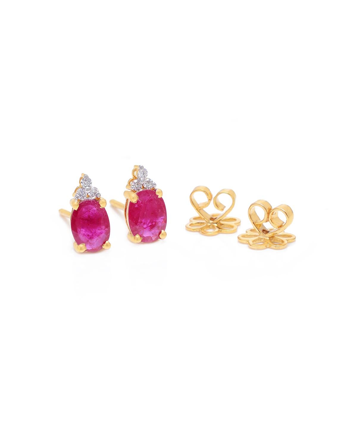 These earrings are made with genuine ruby gemstones and diamonds. They are set in 14K gold. These earrings are perfect for any occasion and make a great addition to any jewelry collection.

Specifications

Dimensions: 
Gross Weight: 2.11 grams
Gold