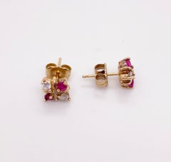 Ruby Stud Earrings with Diamonds X Design in 14 Karat Yellow Gold Posts