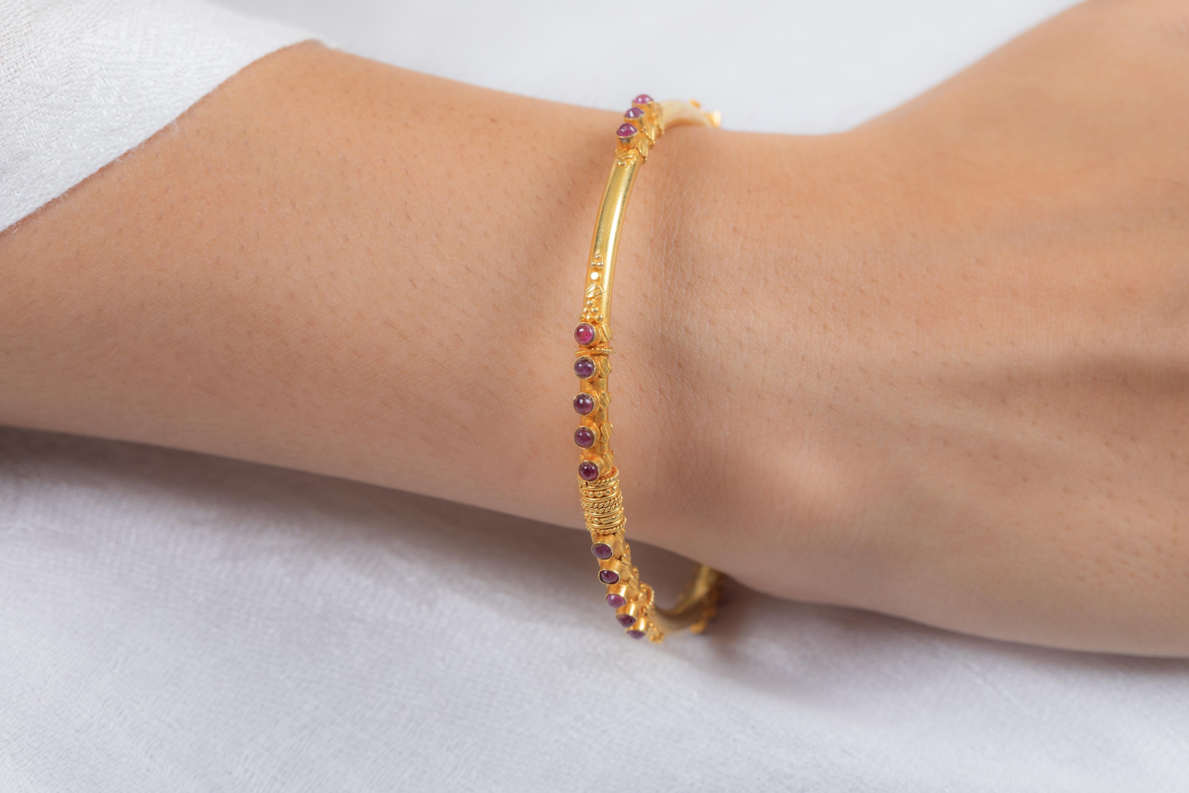 Ruby Bangle in 18K Gold. It’s a great jewelry ornament to wear on occasions and at the same time works as a wonderful gift for your loved ones. These lovely statement pieces are perfect generation jewelry to pass on.
Bangles feel comfortable while