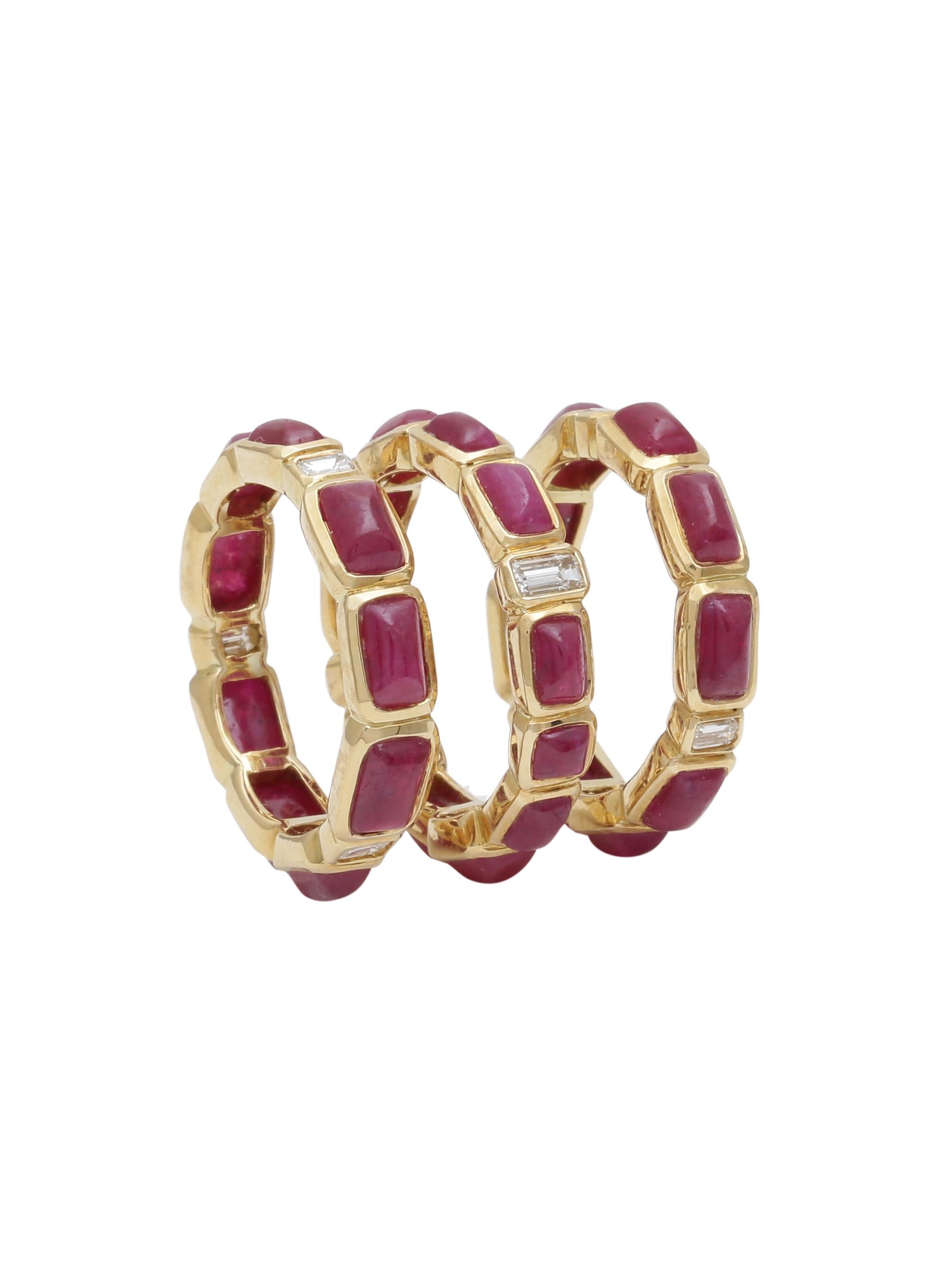 Stackable Ruby Cabochon and Diamond Baguette eternity band all handcrafted in 18K Yellow Gold. The Rubies in the ring are all natural and good quality diamond baguettes.
The simple yet elegant Ruby band can be worn 3 together or single depending on