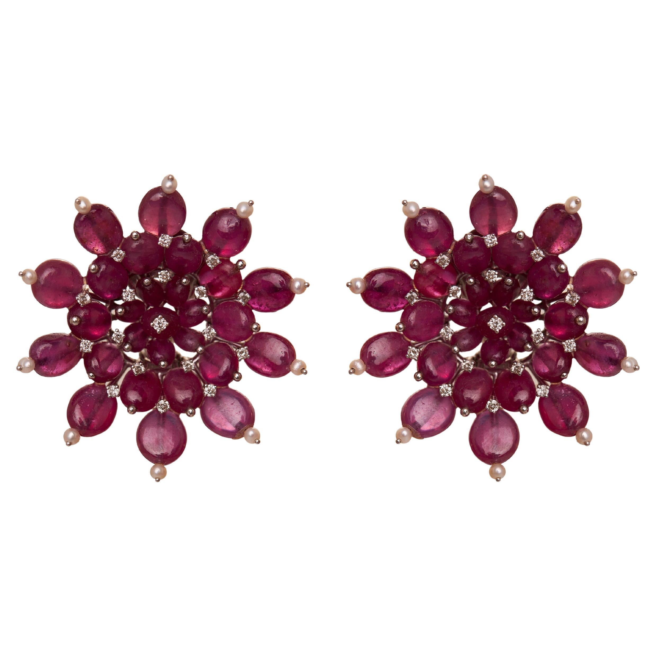 Orecchini Supernova di rubini in oro 18kt in vendita