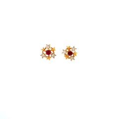 Ruby Surrounded by Stars with Diamonds in 18K Gold