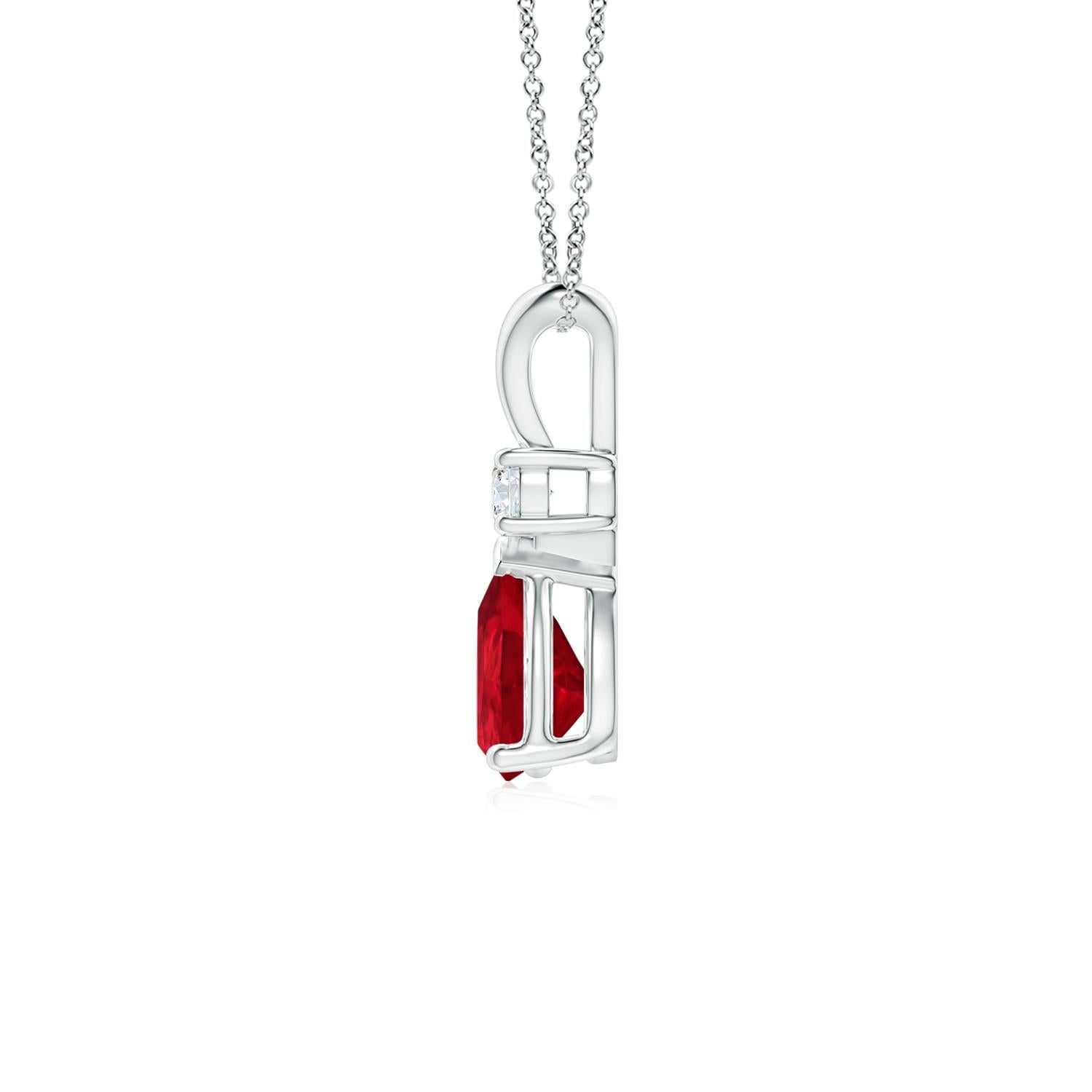 This classic solitaire pendant features a pear-shaped ruby secured in a prong setting. A brilliant round diamond sits atop the purplish red gemstone. Simple yet alluring, this ruby pendant in 14k rose gold is crafted with a lustrous v-bale.<br