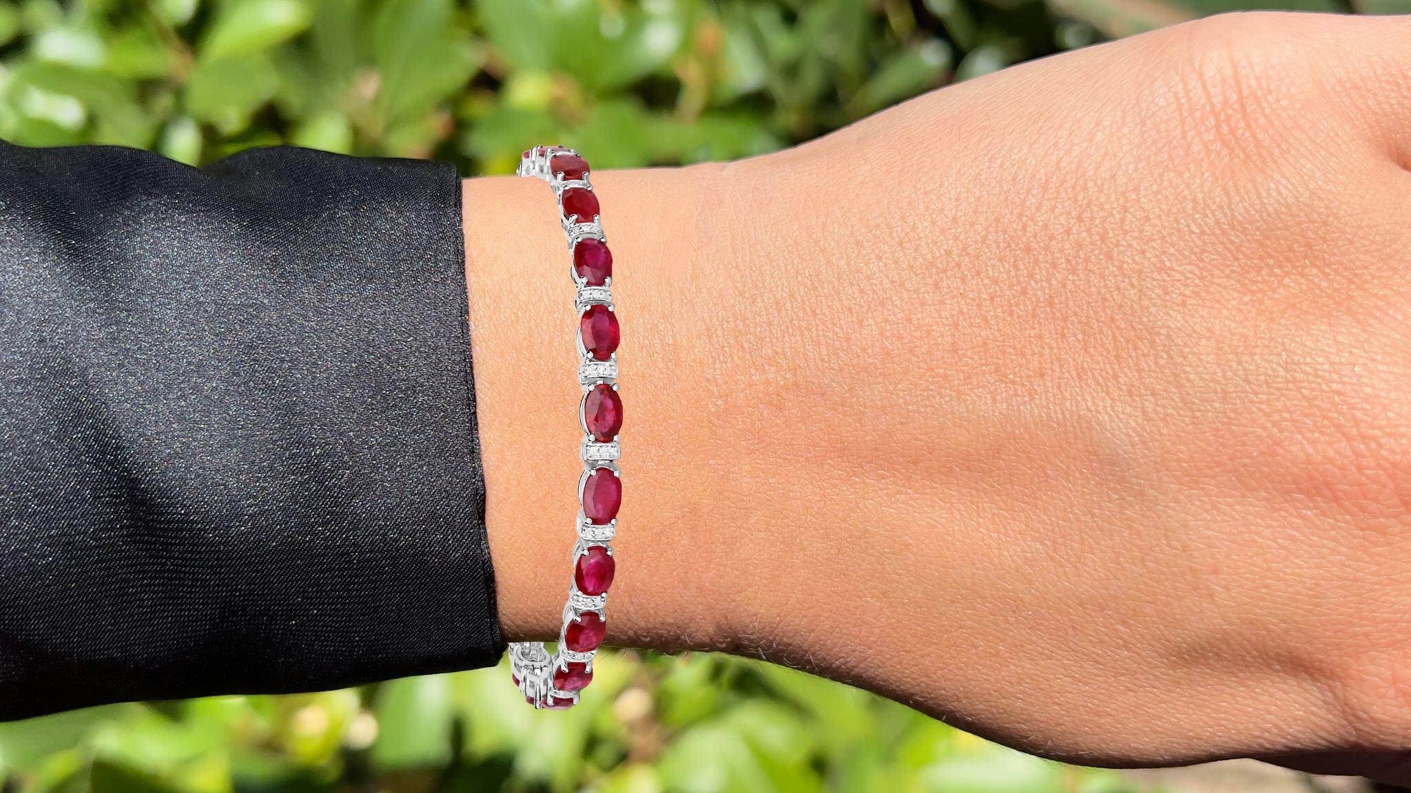 It comes with the Gemological Appraisal by GIA GG/AJP
All Gemstones are Natural
22 Rubies = 11.40 Carats
66 Diamonds = 0.22 Carats
Metal: 14K White Gold
Length: 7 Inches
*It could be shortened on request