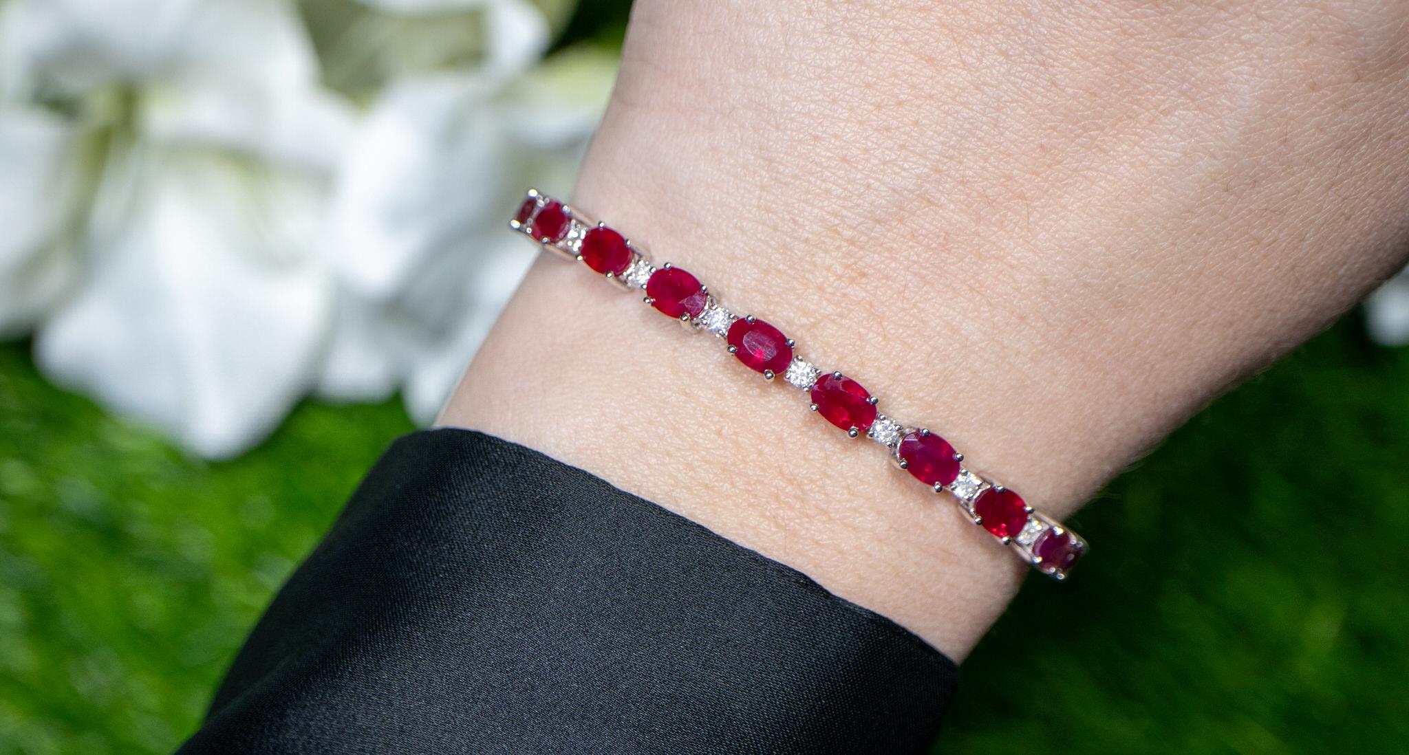 Oval Cut Ruby Tennis Bracelet Diamond Links 14.2 Carats 18K White Gold For Sale