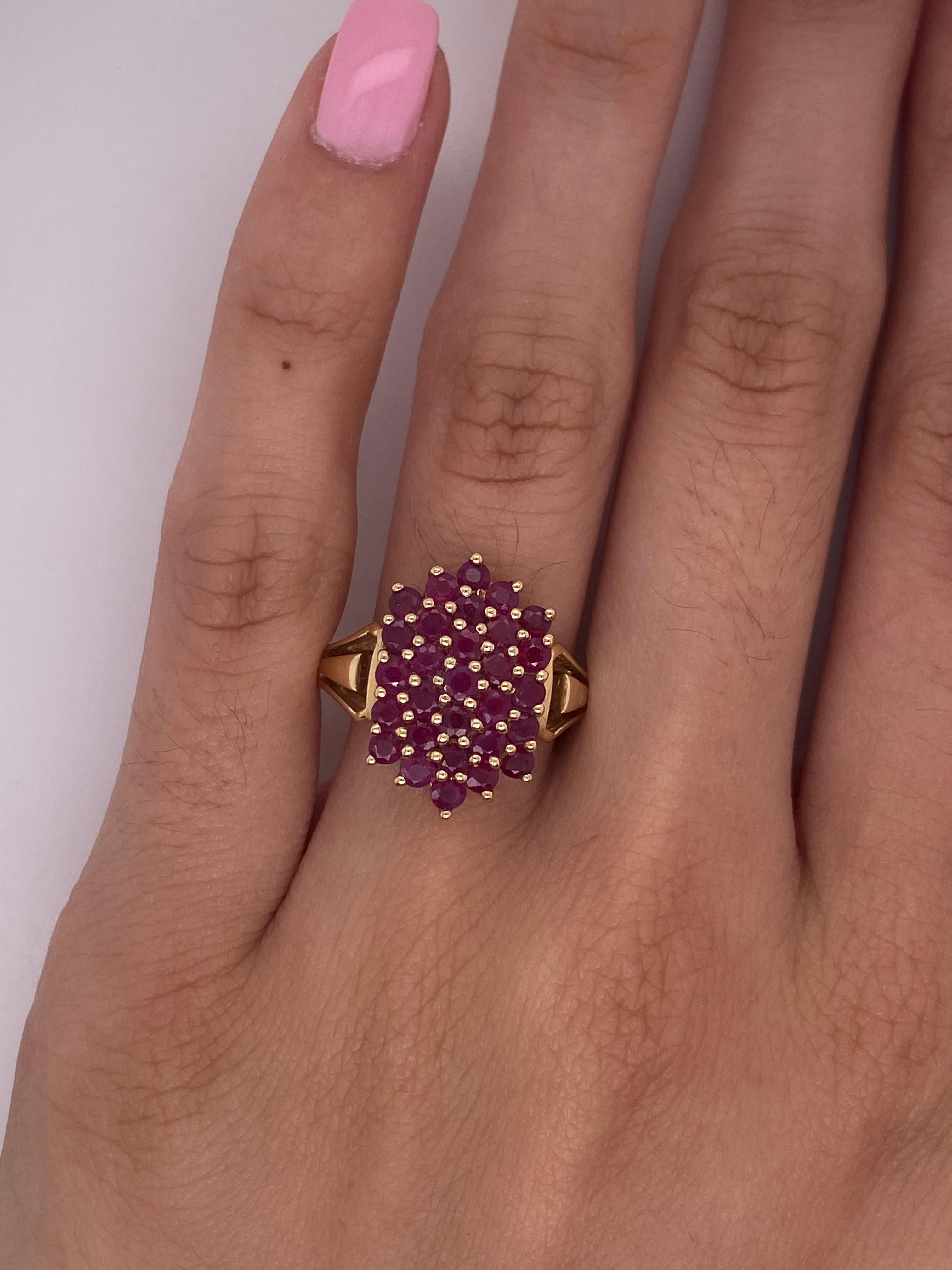 The beauty of this ring shines brightest when it is on the hand. The rich red rubies are like a carpet of red rolling across your finger, set in tiers that stay low to your hand and show their depth of color with almost every shift and turn of your
