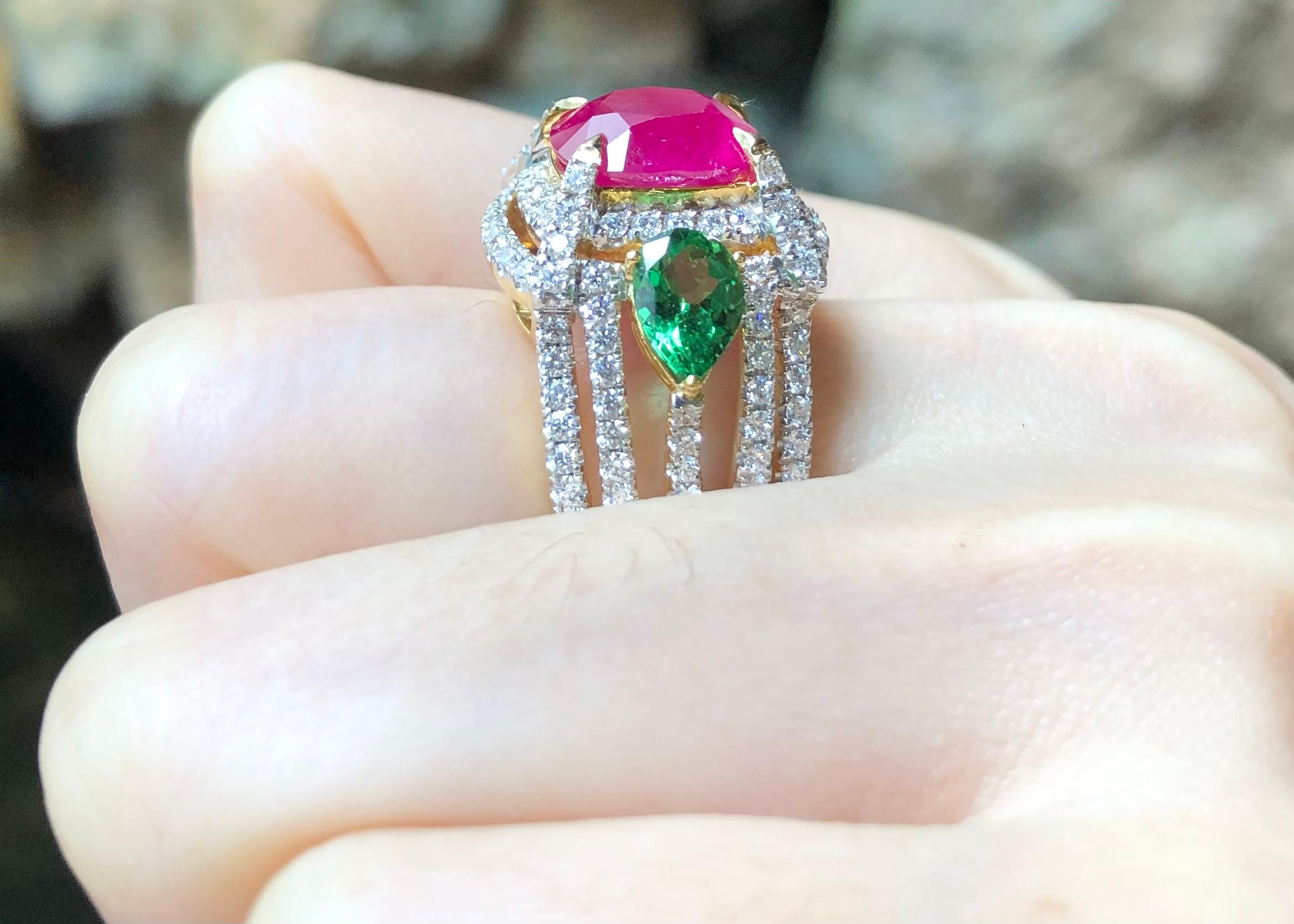 Ruby 4.49 carats, Tsavorite 1.50 carats and Diamond 1.46 carats Ring set in 18K Gold Settings


Width:  2.2 cm 
Length: 1.6 cm
Ring Size: 52
Total Weight: 12.05 grams

Ruby
Width:  0.9 cm 
Length: 1.0 cm


