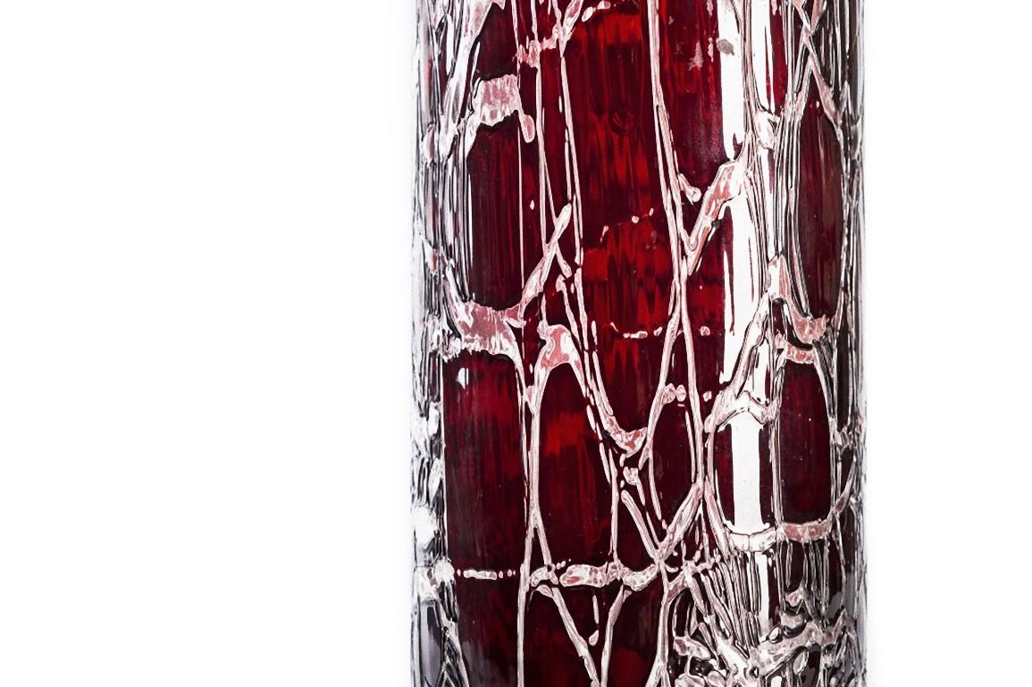 Ruby vase is a beautiful glass decorative object, realized in Northern Europe during the 1970s. 

Very fashionable vase of red ruby colored decoration on the surface.

Good conditions.