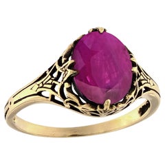 Anello solitario con rubino in stile vintage e filigrana in oro giallo massiccio 14 carati
