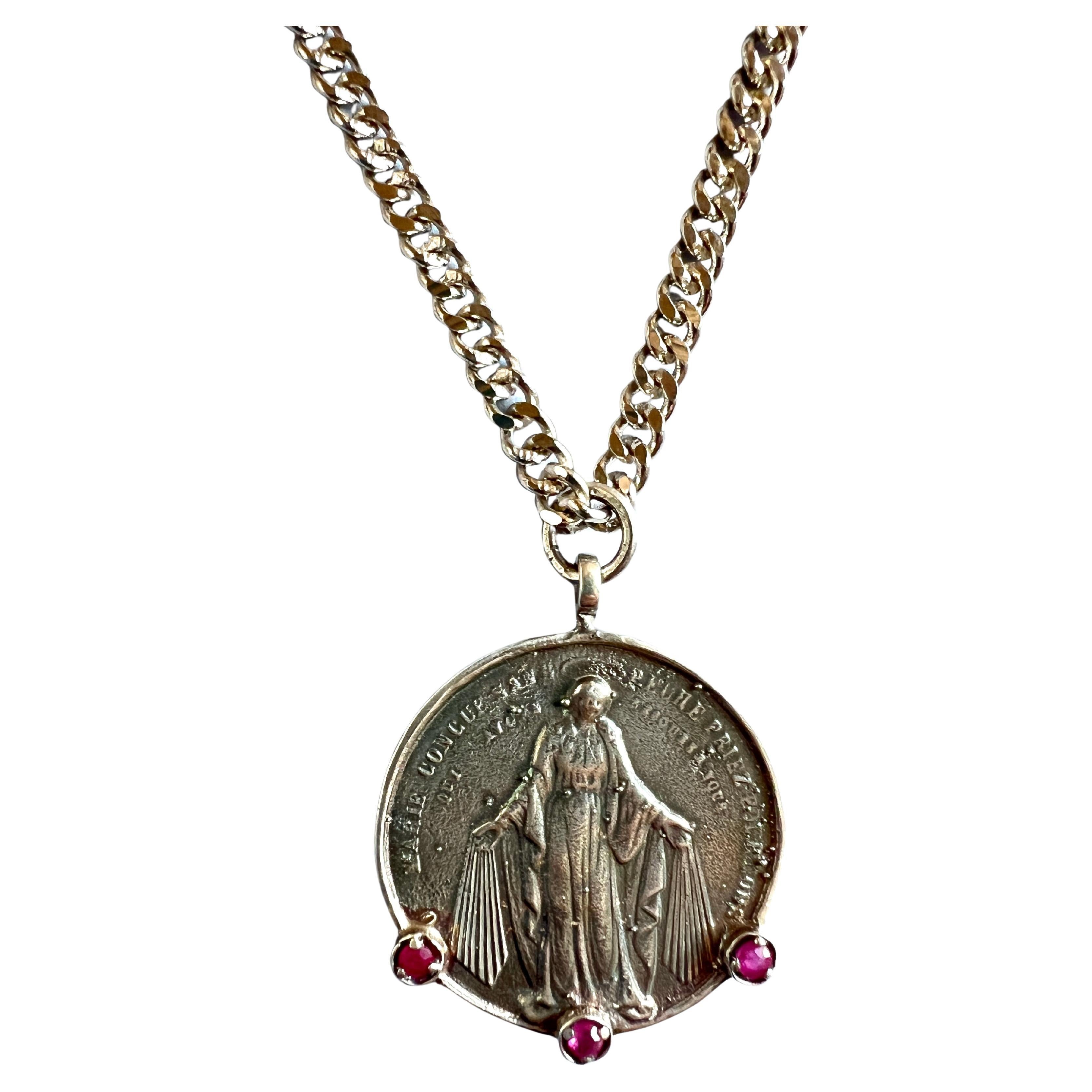 Virgin Mary Medal Chain Necklace Ruby 

Medal Chain Necklace Virgin Mary 3 pieces Ruby Solid Silver Pendant and Palladium Brass Chain Necklace

Designer: J DAUPHIN 
Sterling Silver Medal
Palladium Plated Brass Chain

This medal necklace features