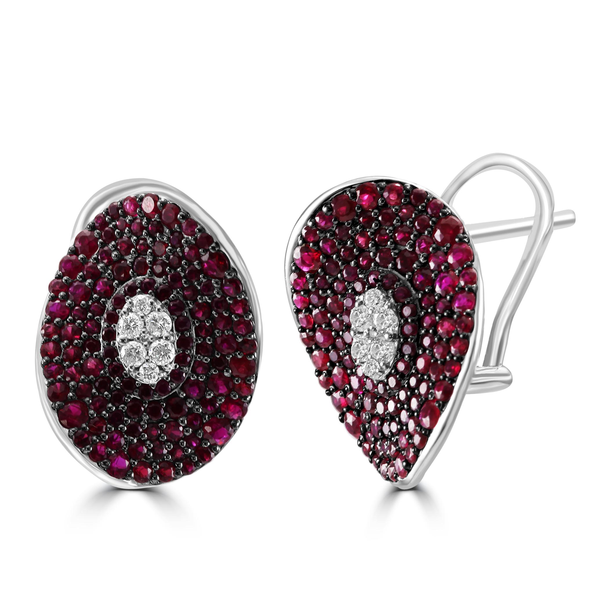 Embrace the vibrant beauty of our beautiful Emerald & Diamond earrings. This harmonious fusion of celestial sparkle and rich green hues creates a captivating pair of earrings that exude elegance and sophistication.

At the heart of each earring, a